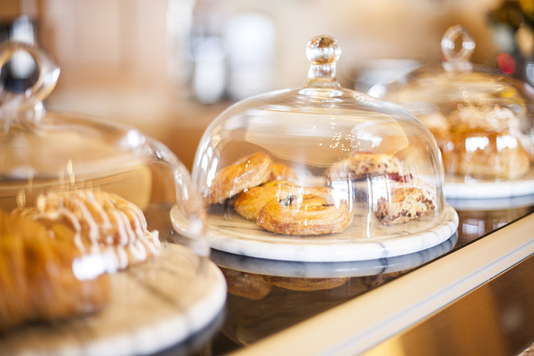 Caffe & Market now features display cases with more than 400 market products, including house-made paninis and pastries to-go.