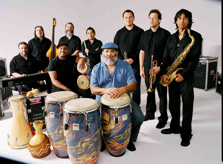 Pancho Sanchez (in blue) and his band 