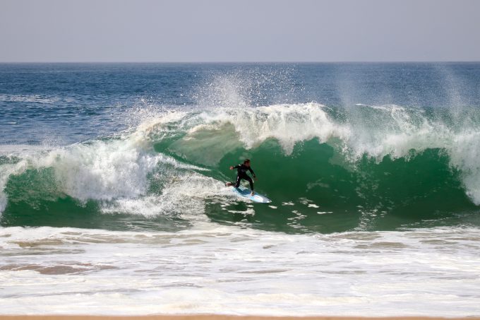 Riding a wave at the Wedge. 