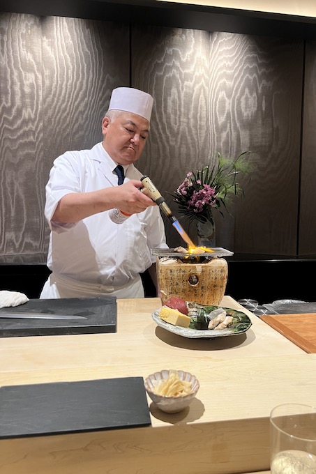 6 Chef Koji Takahashi searing the sushi-credit Ashley Ryan